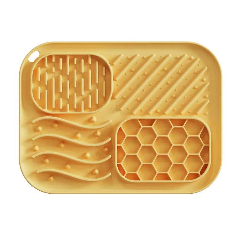 Yellow calming lick mat top view with textured licking zones